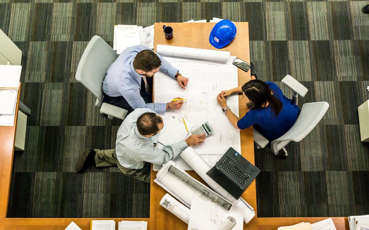 Project delivery professional reviewing work